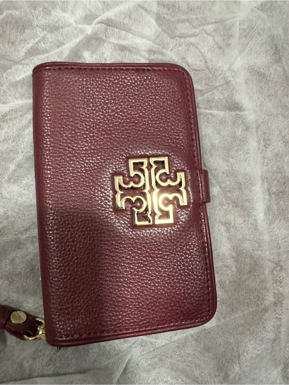 Tory Burch Pebbled Leather Wristlet in Deep Burgundy with Gold Logo